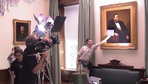 taking light reading on grant portrait at white house